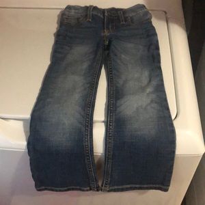 Pair of 5 slim wrangler girl jeans